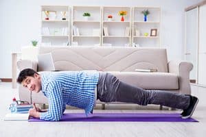 Man exercising with book